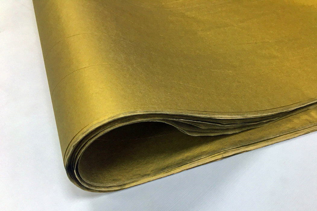A fold of sheets of Gold tissue paper