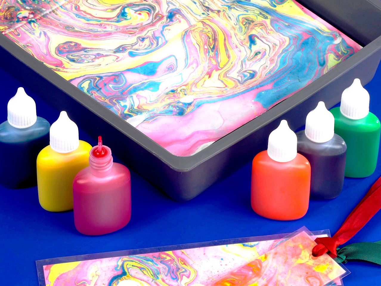 Bottles of marbling inks with tray