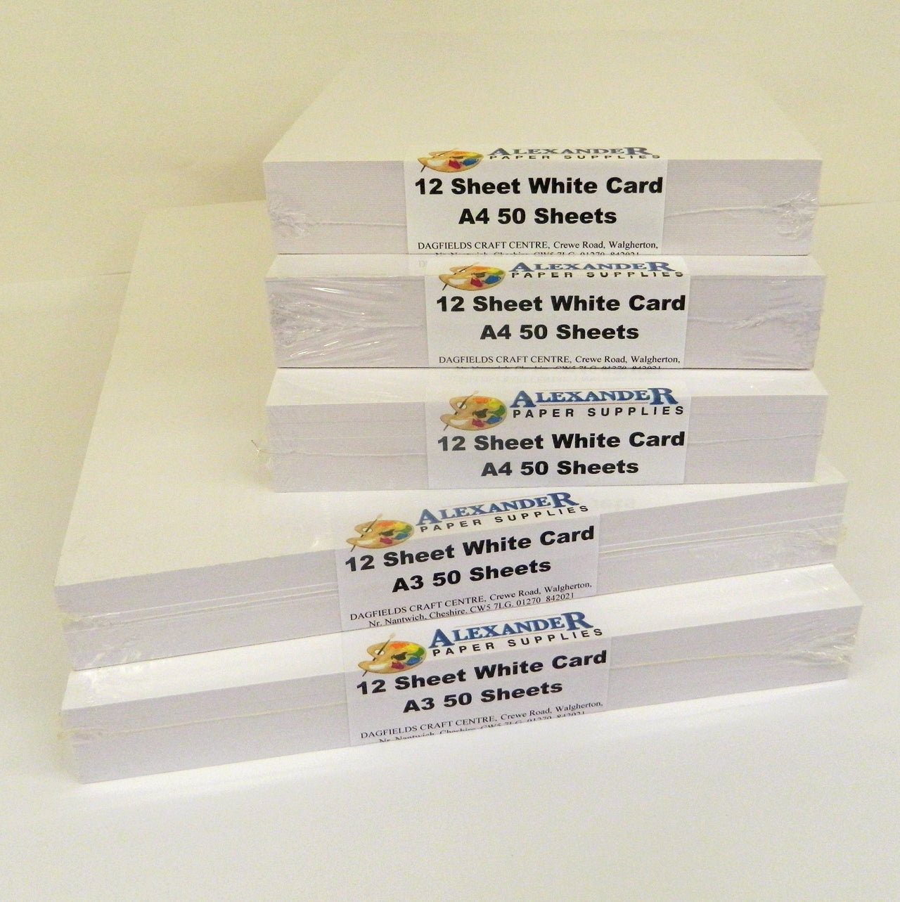 Stack of packs of white card