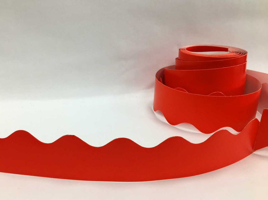 Red coloured wavy card border roll