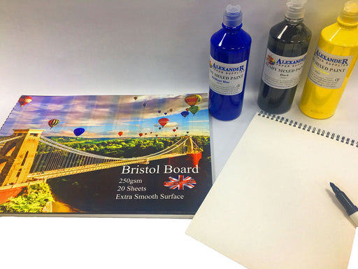 Bristol board pad and bottles of ready mix paint