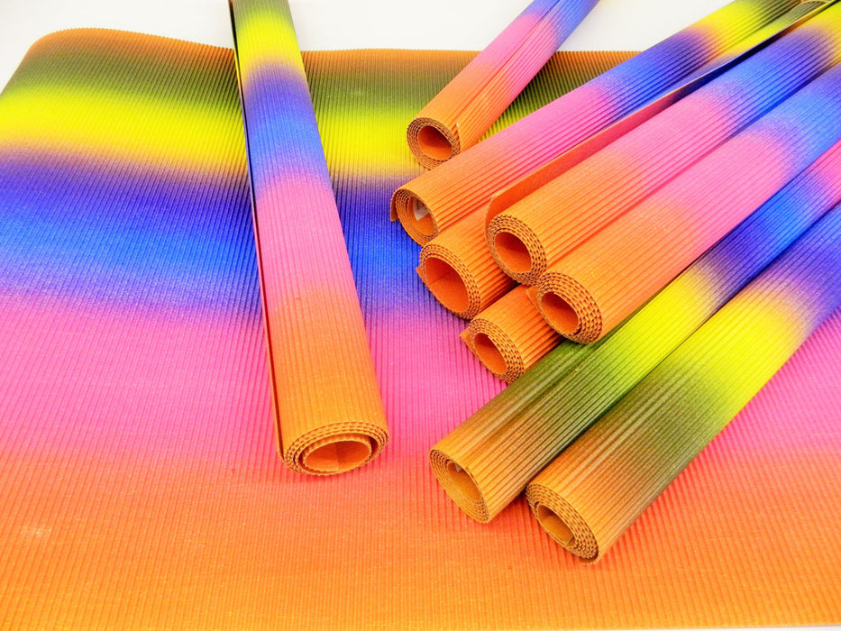 Rolls of rainbow coloured corrugated card