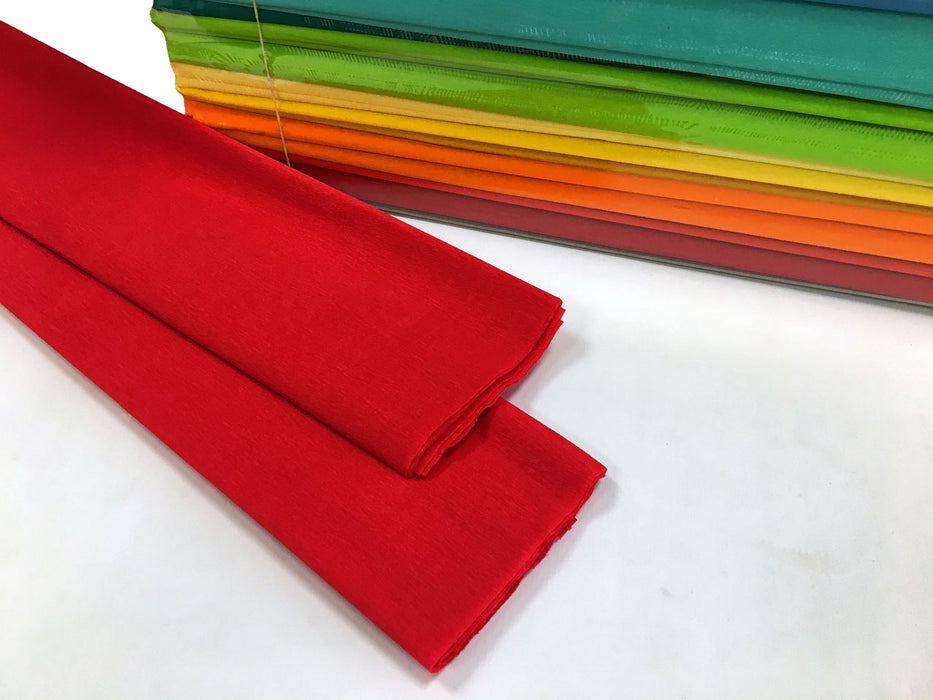 Two folds of crimson coloured crepe paper