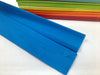 Two folds of mid blue coloured crepe paper