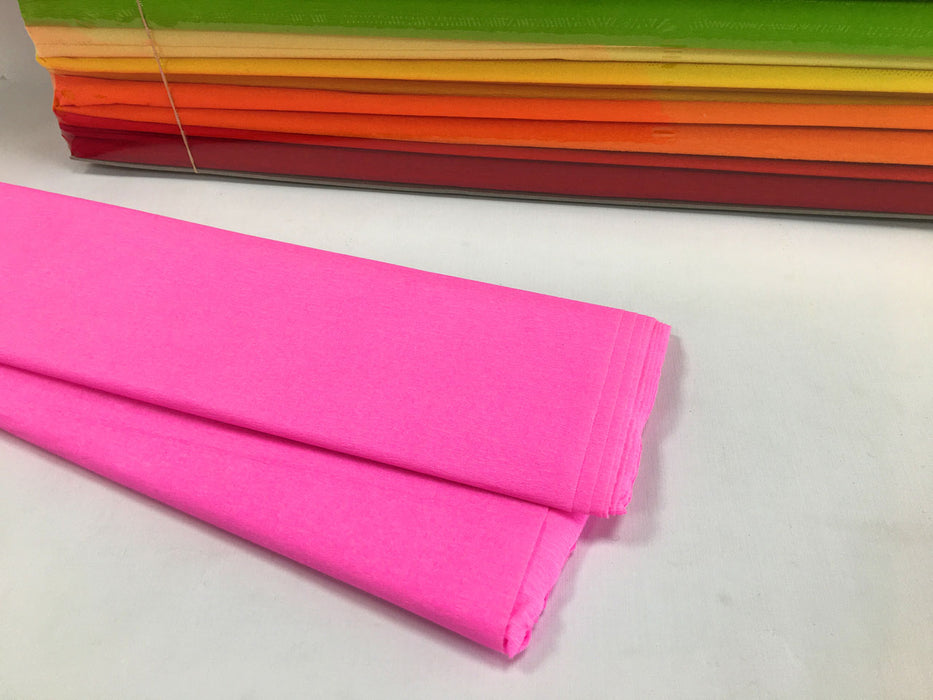Two folds of pink coloured crepe paper
