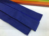 Two folds of royal blue coloured crepe paper
