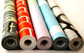 5 rolls of background display paper with various designs