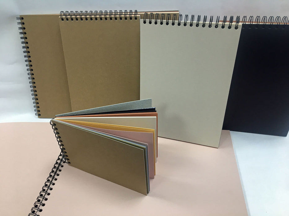 An array of Earthtone spiral sketchbooks