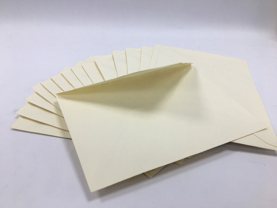 Cream envelopes 7" x 5"