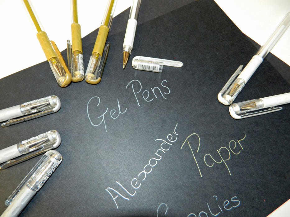 Gel Pens in use on black paper