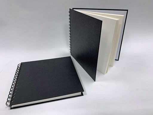 Two sketchbooks with black cover and spiral binding