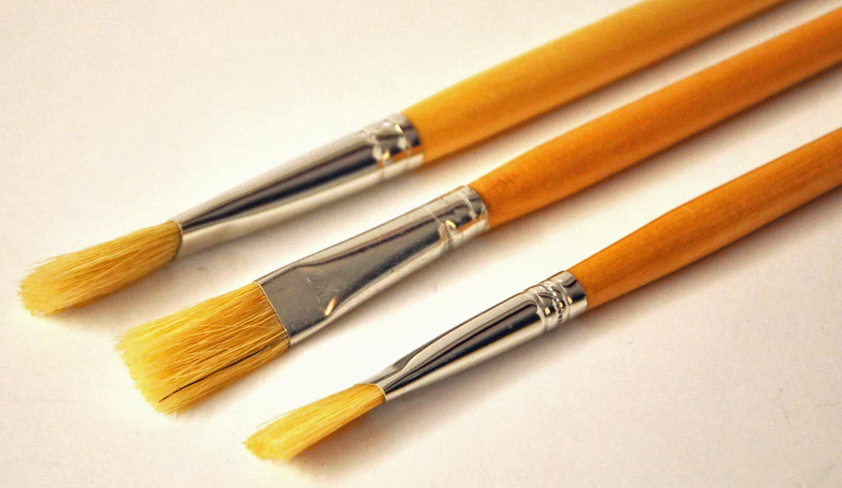 Three hog bristle brushes