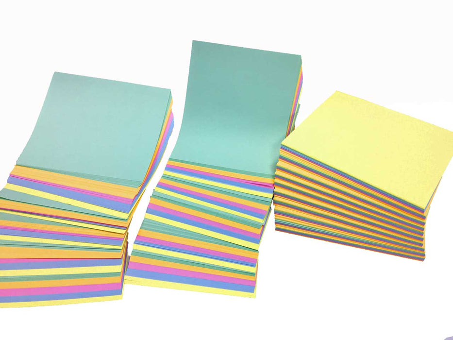 Stacks of pastel coloured paper