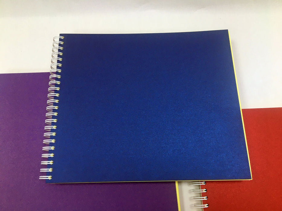 Spiral pads showing blue cover
