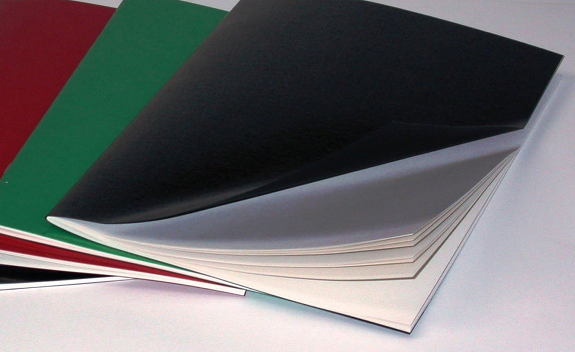 3 stapled sketch books with black green and red covers