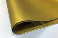 Gold tissue paper folded over