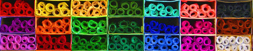 Rolls of tissue paper in a range of vibrant colours