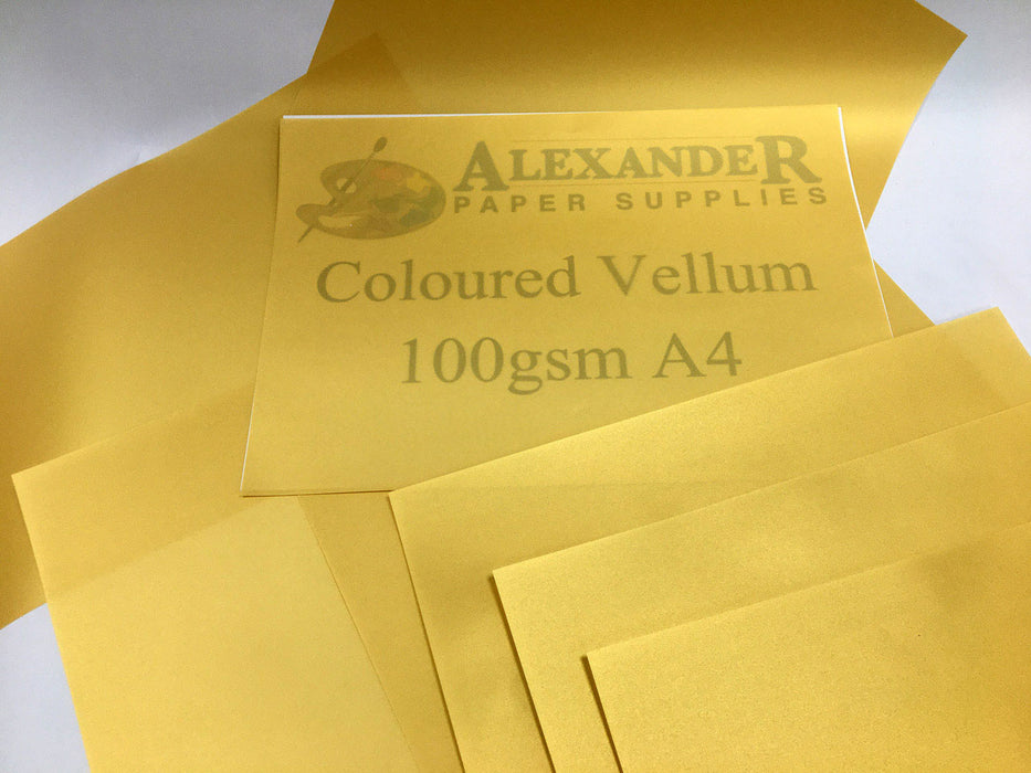 Sheets of gold coloured vellum paper