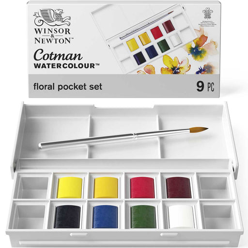 Set of Cotman half pan paints including brush and container