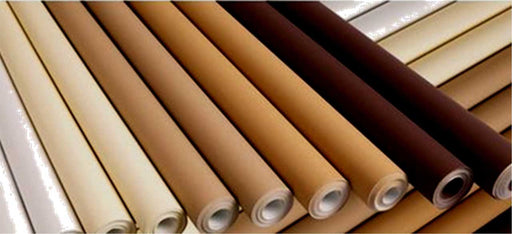Rolls of wide poster paper in shades of brown