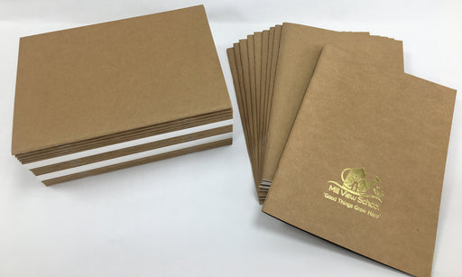 Stack of sketchbooks showing foil blocking