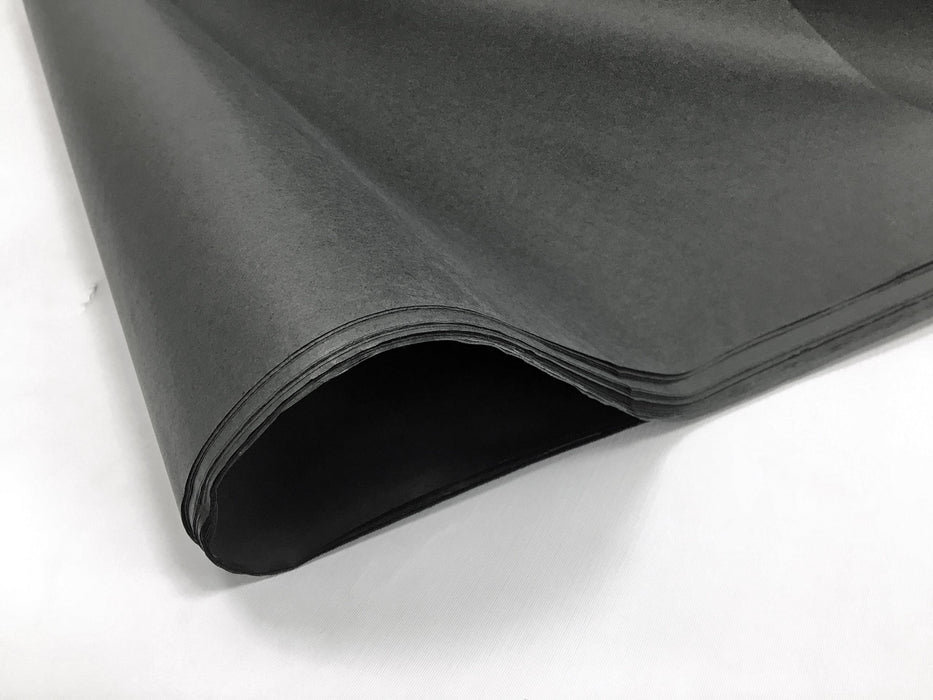 A fold of black tissue paper
