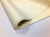 A fold of cream coloured tissue paper