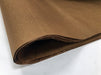 A fold of brown tissue paper