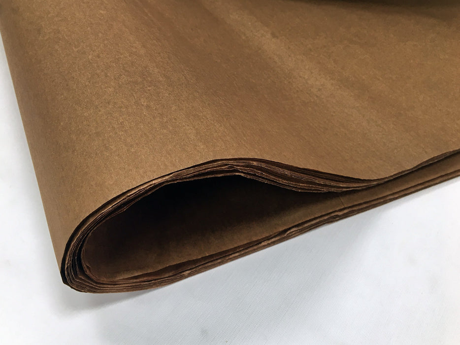 A fold of brown tissue paper