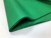 A fold of deep green tissue paper
