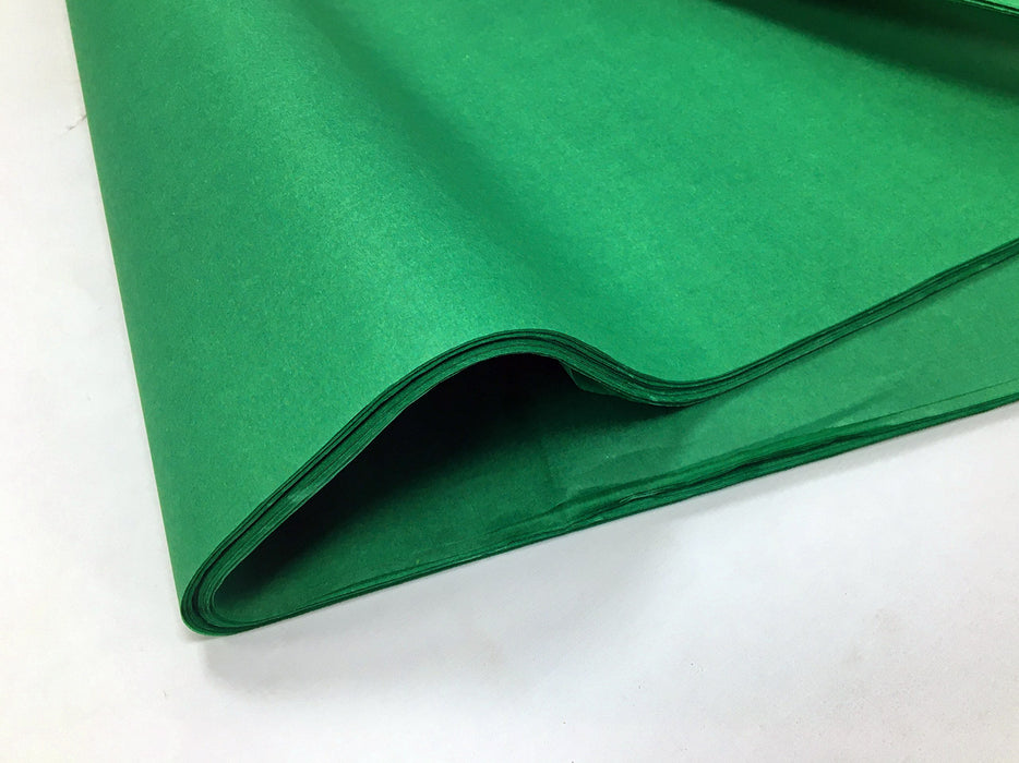 A fold of deep green tissue paper