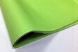 A fold of light green tissue paper