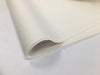 A fold of white tissue paper