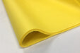 A fold of yellow tissue paper